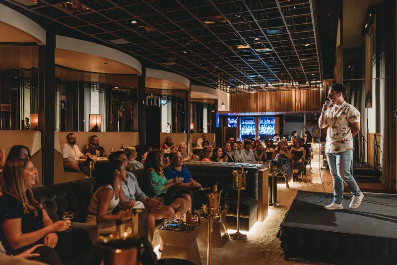 Audience laughing at a Top Flight Comedy showcase in Austin